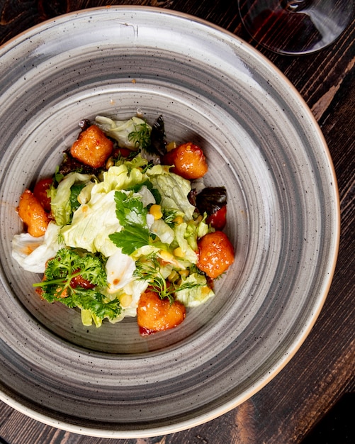 Free photo salad with lettuce chicken corn and greens