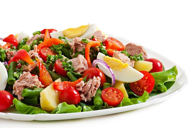 Salad with tuna, tomatoes, potato and onion