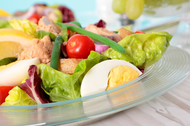 Salad with tuna and vegetables closeup 