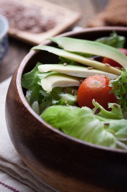 Salad in a wooden bowl