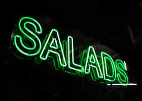 Free photo salads fast food sign in neon lights