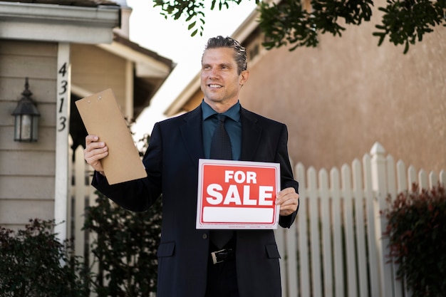 Sale agent preparing for presenting house