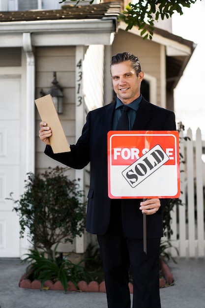 Sale agent preparing for presenting house