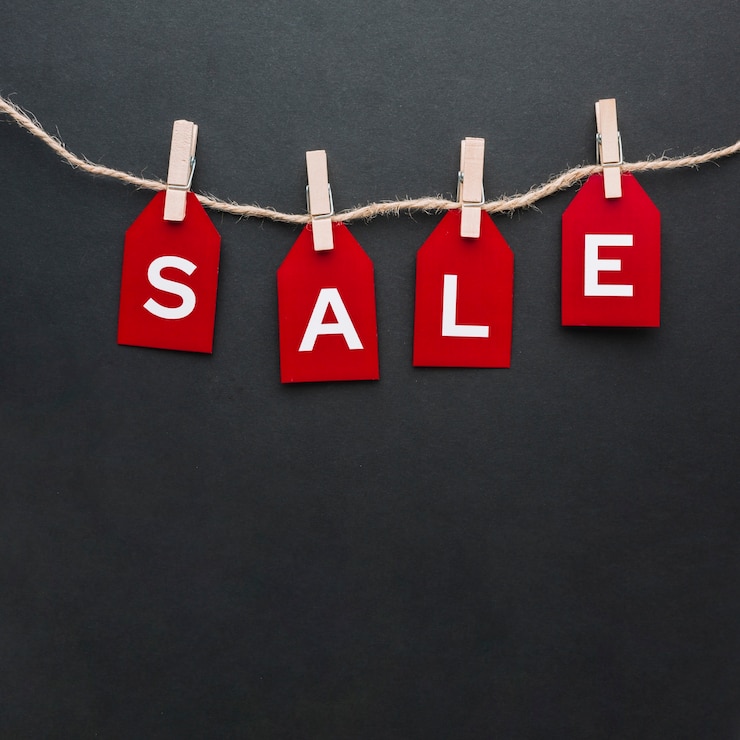 Free Photo sale concept on black background