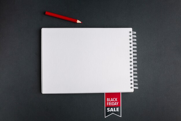 Sale notebook mock-up with pencil