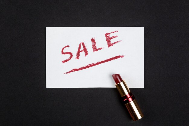 Sale written with red lipstick