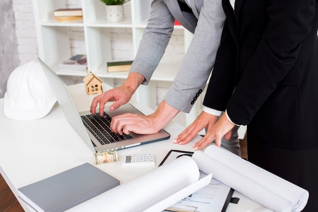 Sales agent using a laptop