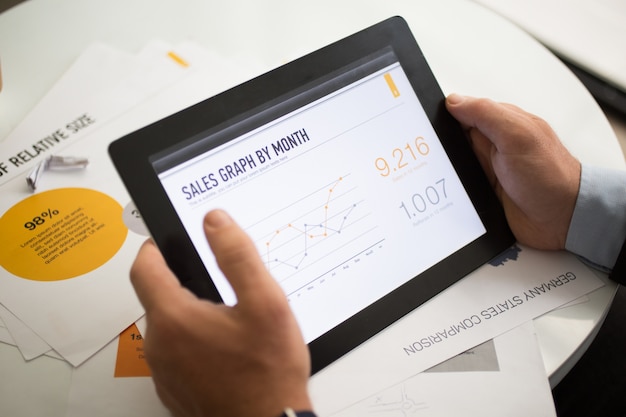 Sales graph on tablet screen