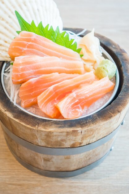 Salmon fillets on wooden container