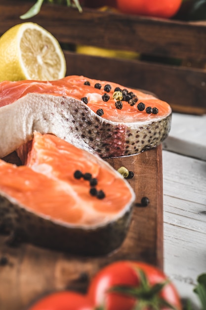 Salmon slices with lemon and pepper