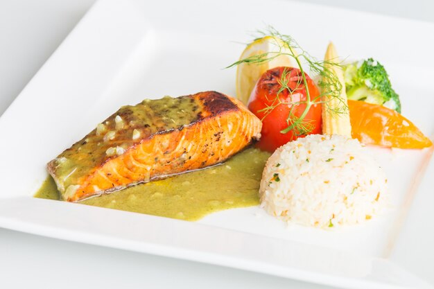 Salmon steak on white plate