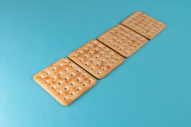 Salt crackers on the blue background