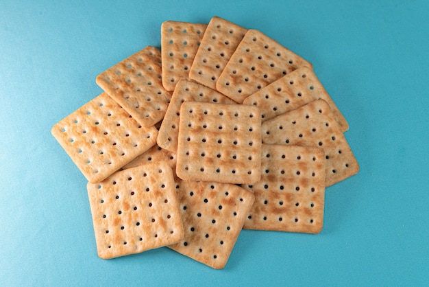 Salt crackers on the blue background