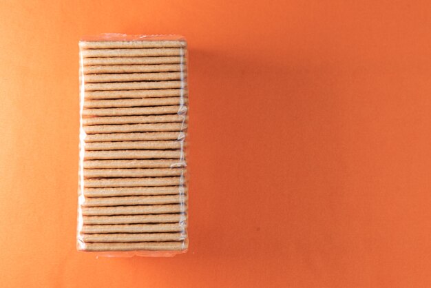 Salt crackers on the orange background