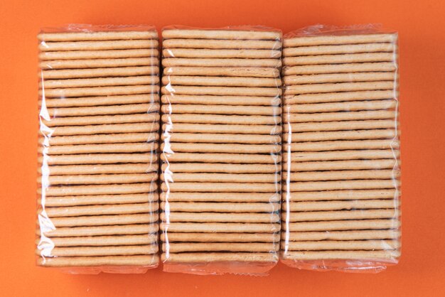 Salt crackers on the orange background