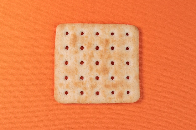 Salt crackers on the orange table