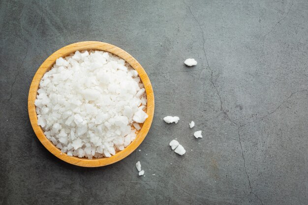 salt in wooden small plate