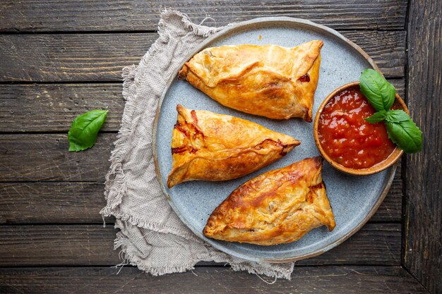 Samsa or samosas with chicken fillet