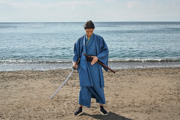 Samurai with sword outdoors