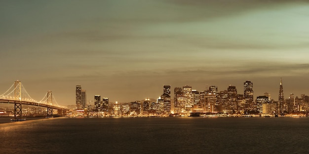 San Francisco city skyline panorama with urban architectures at night.