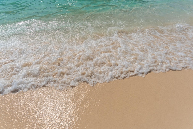 Free photo sand beach and ocean wave