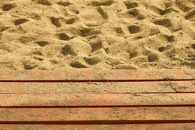 Sand beach with wooden boards