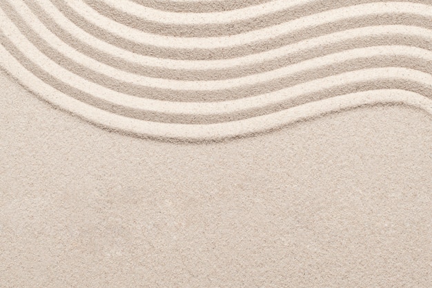 Sand wave nature textured background in wellness concept