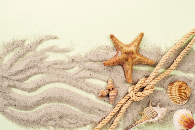 Free photo sand with nautical rope