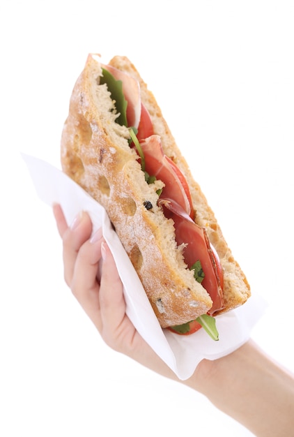 Foto gratuita sandwich in una mano