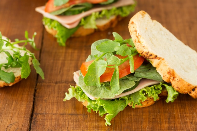 Sandwich with cucumber on table