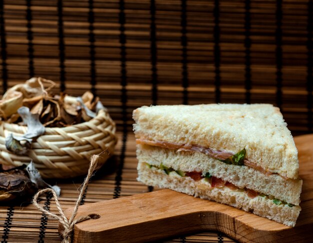 Sandwich with white bread on desk