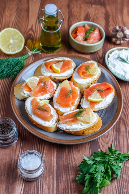 Sandwiches with smoked salmon and cream cheese and dill.
