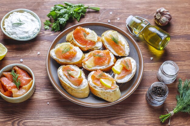 Sandwiches with smoked salmon and cream cheese and dill.