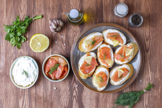 Sandwiches with smoked salmon and cream cheese and dill.