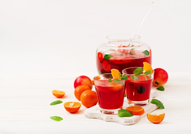 Sangria with fruits and mint