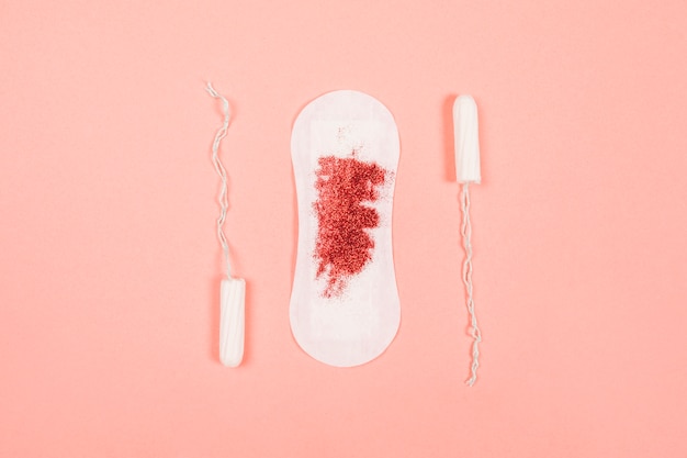 Free photo sanitary towel with glitter and tampons