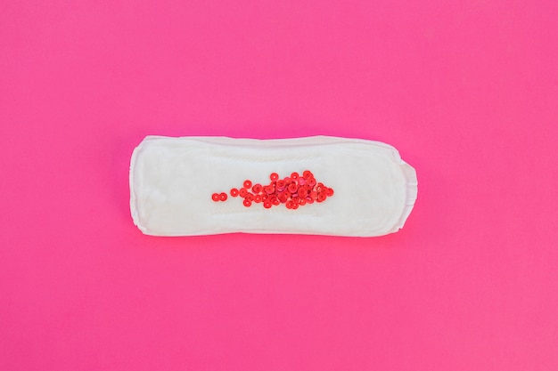 Free photo sanitary towel with red sequins