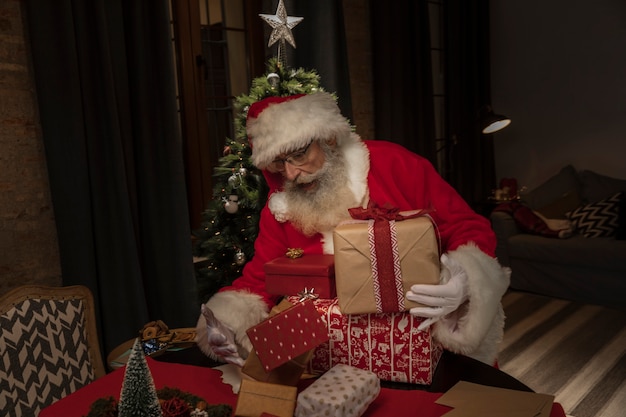Santa claus delivering christmas gifts