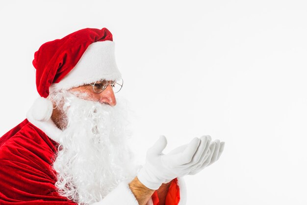 Santa Claus holding something in hands