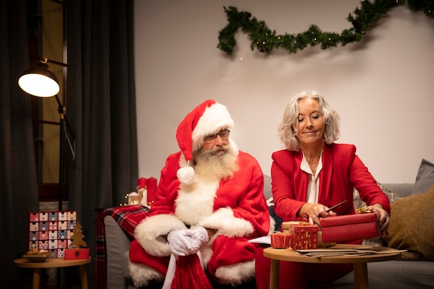 Santa claus and senior woman together