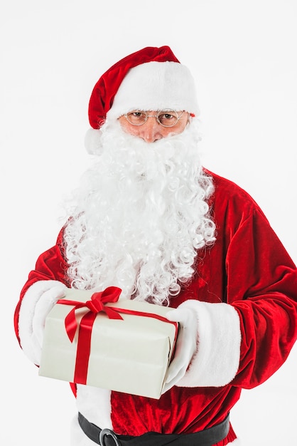 Free photo santa claus with gift box