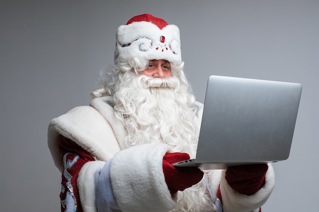 Santa Claus with laptop