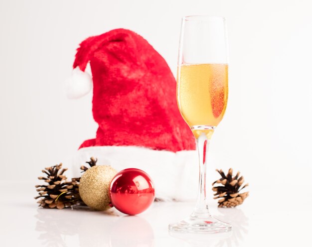 Santa hat with a glass of champagne