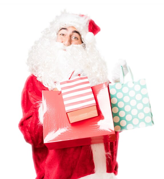 Santa with shopping bags of colors