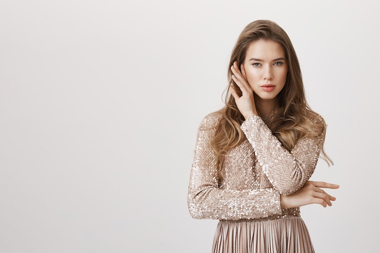 Free Photo sassy beautiful woman touching cheek, wear evening dress