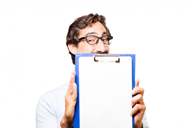 Free photo satisfied businessman holding a clipboard with a blank paper