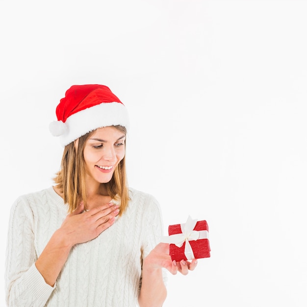 Free photo satisfied woman with gift box