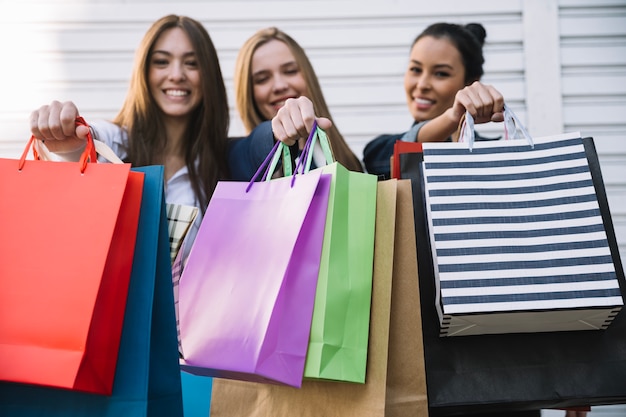 Free photo satisfied women after shopping