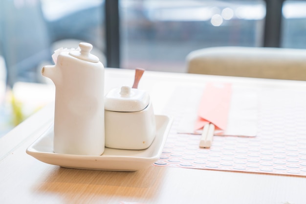 sauce bottle on table in restaurant