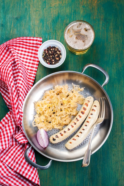 Sausages on a metal plate